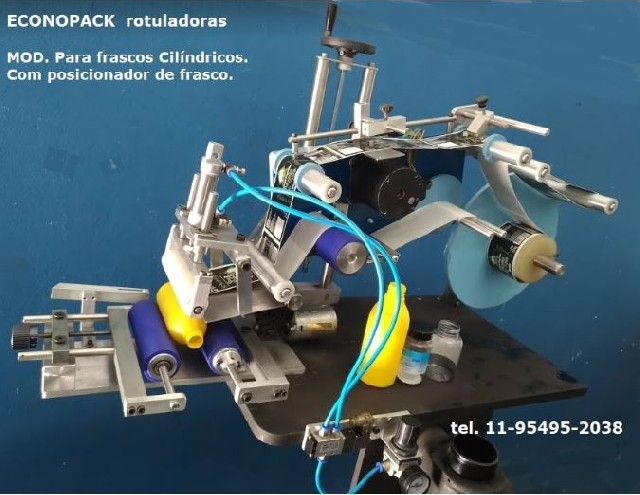 Foto 1 - Envasadora e rotuladora